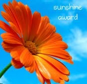 A Sunshine Award from the gorgeous Deb.....