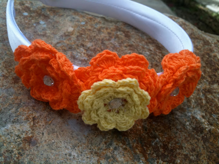 white and orange crochet flower headband
