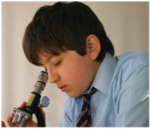 [LE+boy+looking+through+microscope.bmp]