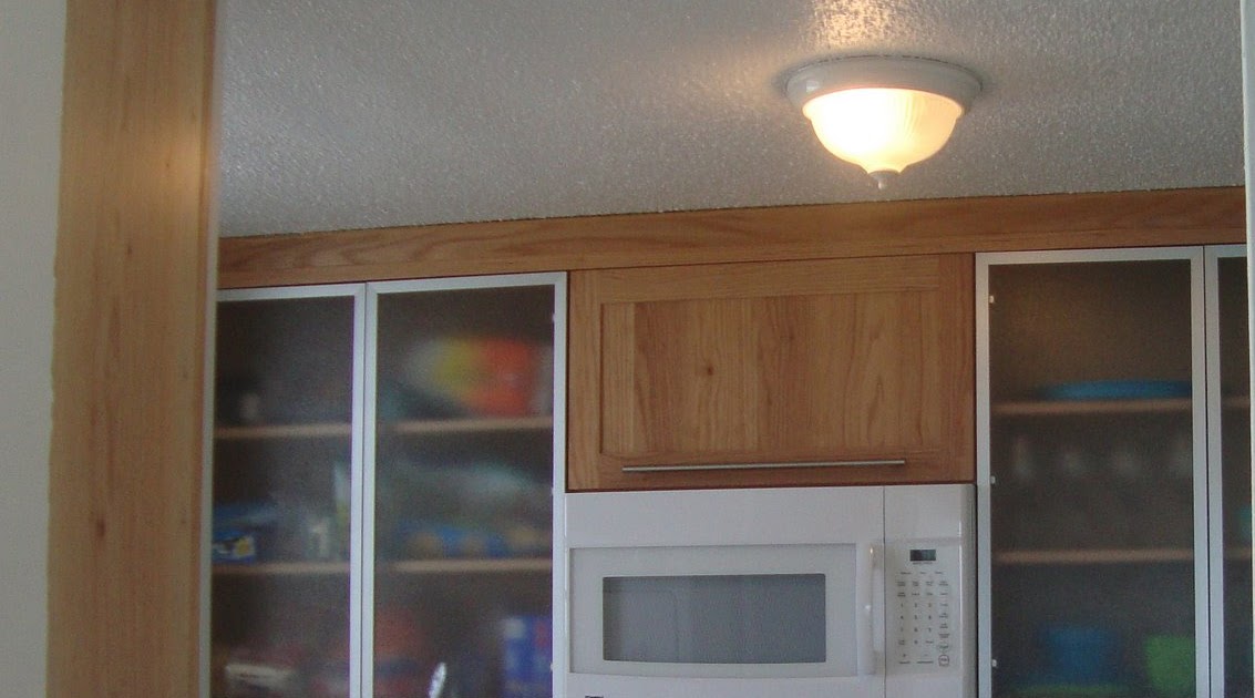 Ebanistería Cintrón: Gabinete de Cocina en Roble Rojo con Tope de Granito