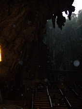 Exploring "Batu Caves" with a guide.