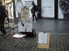 Caricature artists at Market Place in Brussels..