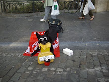 A pet dog "Begging" for donations for its owner at "Grand Place' in Brussels.(Saturday 22-5-2010).