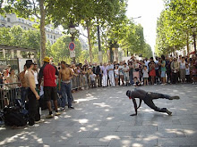 A street performer  on pavement of "Champs elysees".(Monday 24-5-2010).