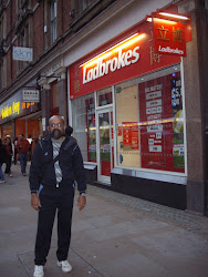 Self outside a "Ladbrokes shop" in West End of London.