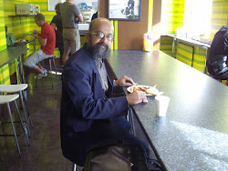 "Breakfast at Piccadilliy Backpackers" hostel dining room.