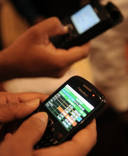 India launches mobile phone share trading