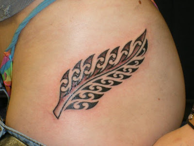 silver fern tattoo on foot. how to take care of large fern leaf