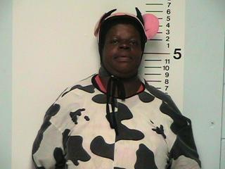 [cow+suit+arrest.jpg]