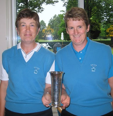 Alex and May hold the West Vets Trophy