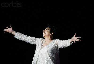 A fire shaped palm Dramatic Liza Minnelli has a fire shaped palm