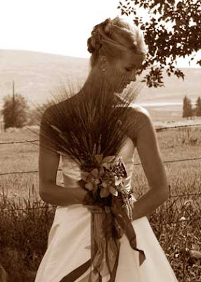Backyard Country Wedding Ellensburg Wedding Photo of bride and wheat stalk bouquet in sepia