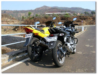 Back View: Stock Pulsar 220 and Stock Karimza