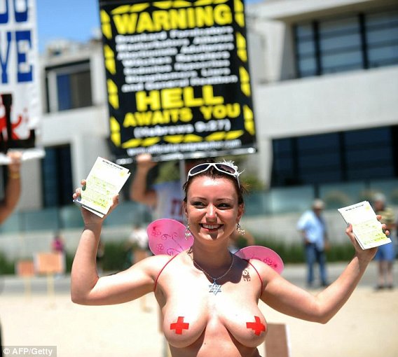 'Go Topless Day' Coverage Easy Publicity for Bizarre Raelian Cult