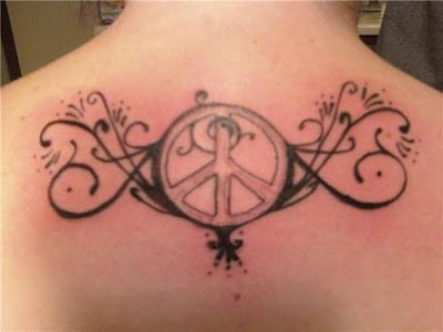 Peace sign with swirls on upper back tattoo. Peace sign with swirls on upper Peace sign with swirls on upper back tattoo. Peace sign with swirls on upper