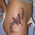Sexy girl with butterfly tattoos art on the body