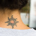 celtic tattoo on back girl