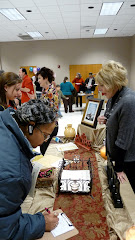 Debbie and Marcia visiting with community members about 5:17