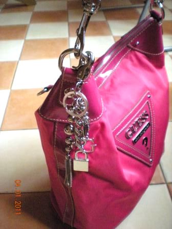 Shopaholic Anonymous: Authentic Pink Guess handbag with charms