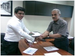 Rehaan Javaid Qureshi (Director Projects PCAPH) Receiving Main sponsor cheque from MOL Oil Company