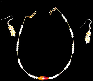Pearl and Pipe neck set and Pearl ear ring