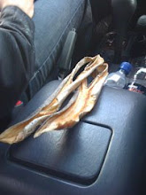 Daniel snacks on dried haddock while driving