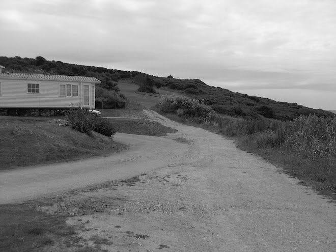 CARAVAN ON HILLSIDE