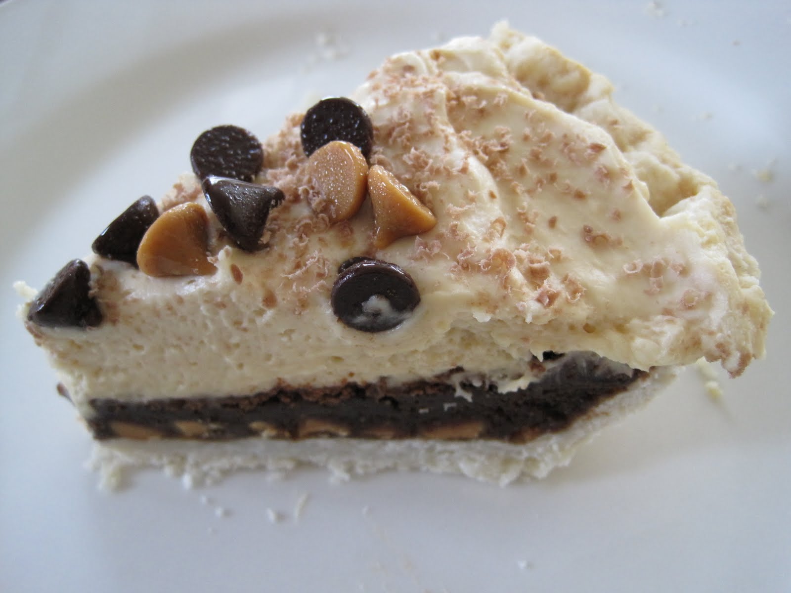 Some Kind of Delicious Mile High Peanut Butter Brownie Pie