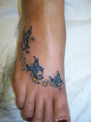 Butterfly Tattoos Foot Butterflies have symbolic meanings