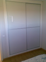 Decoraciones Sahuquillo: Armario puertas correderas cristal blanco