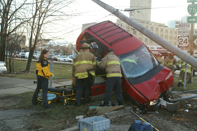 Car wreck at woodward and University