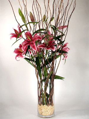 Twisted Willow Branches and Lilies For this display we placed a smaller 