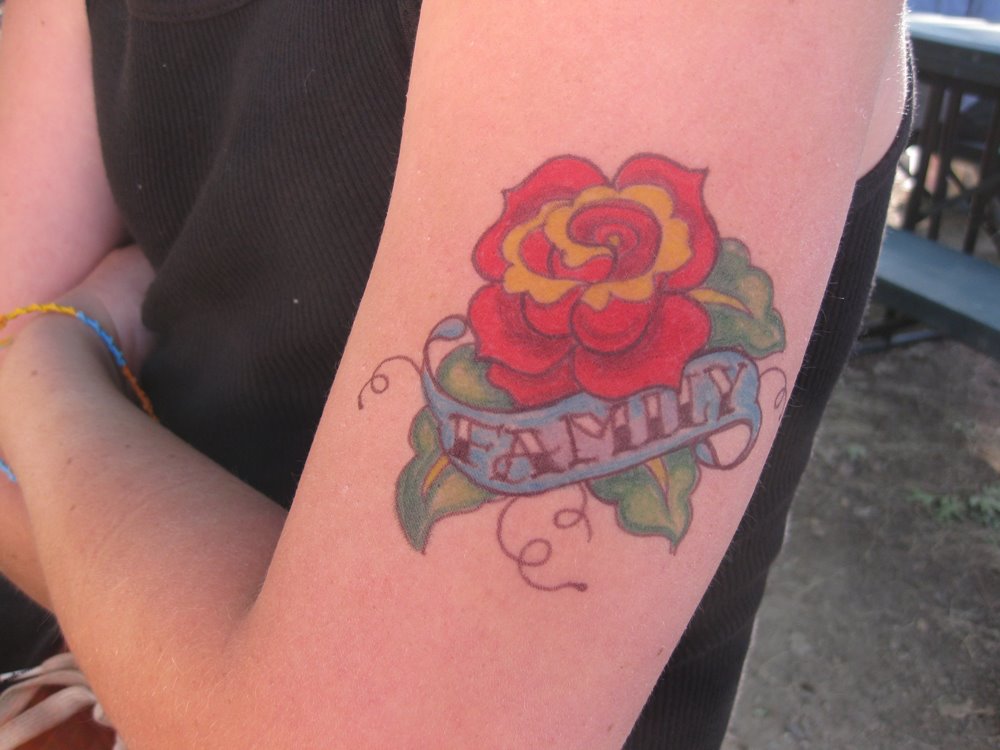 [catheholdentattoofamilyrose.jpg]
