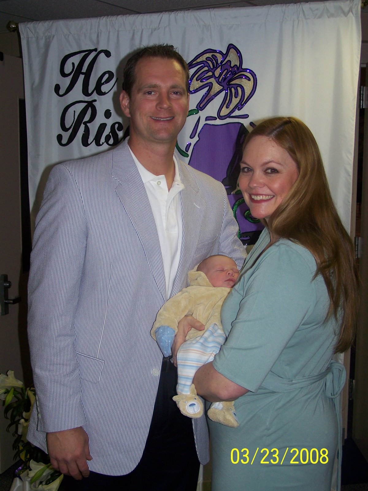 [daddy+and+mommy+w+trey+at+1st+church+service+easter.JPG]
