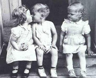 Niños Besos