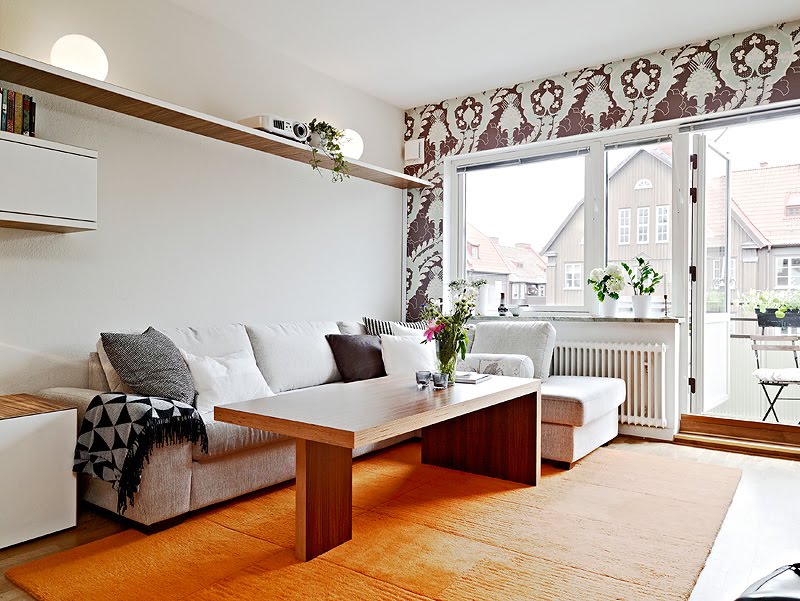 decoracao de apartamentos pequenos rustico: que legal a prateleira que “atravessa a parede da sala” de lado a lado decoracao de apartamentos pequenos rustico: que legal a prateleira que “atravessa a parede da sala” de lado a lado