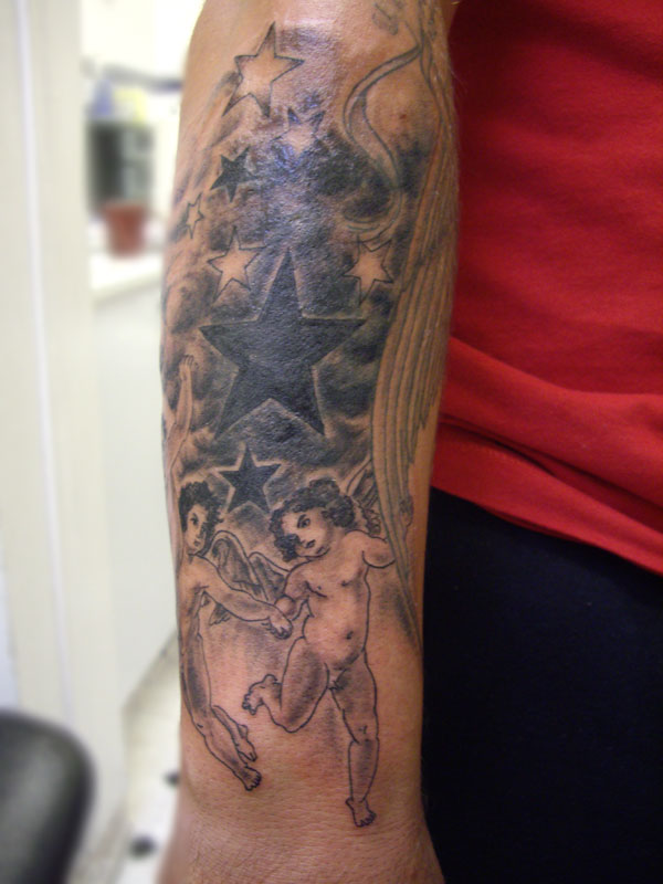 a star and cherubs tattoo cherubs tattoos. a star and cherubs tattoo
