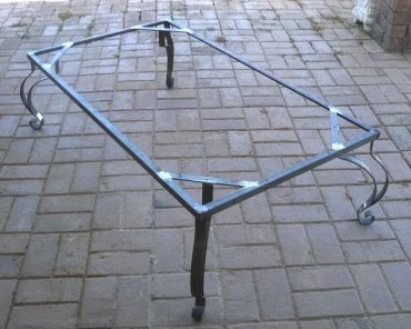 Farmweld: Custom wrought iron design, coffee table legs