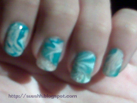 I came across Trishza's blog page and saw her post on Water Marbling