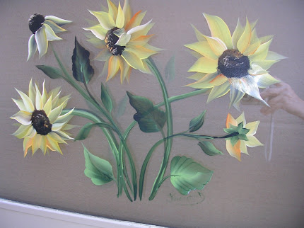 Sunflowers on old window