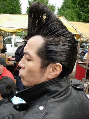 A pompadour is often created