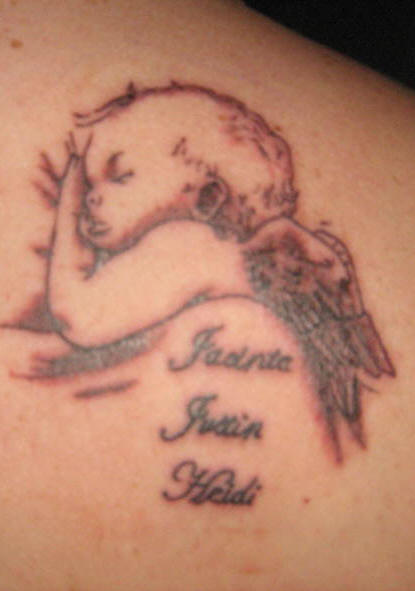 Sleeping baby angel tattoo picture.