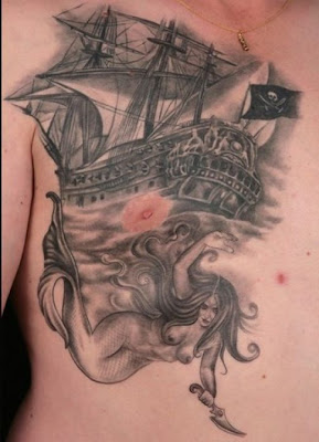 Classic pirate ship tattoo with woman.