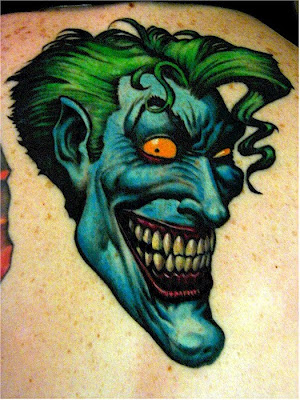 Cartoon joker tattoo