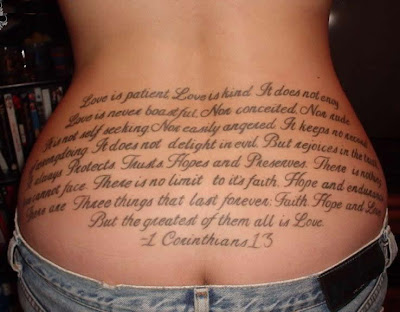 Scripture lower back tattoo.