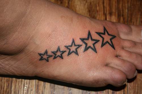  image Five stars small to large foot tattoo