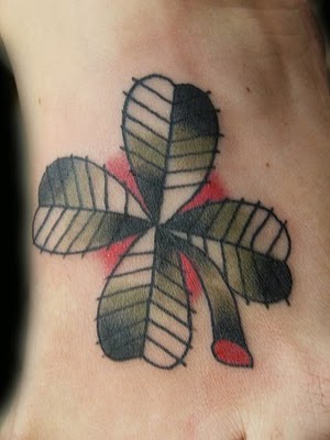shamrock tattoo designs. clover tattoos are almost