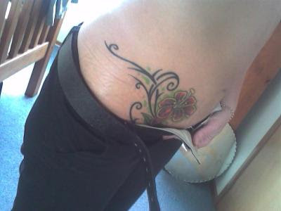 FINE HIP PIECE Lower Back Tribal Tattoo Designs Cute lower flower art.