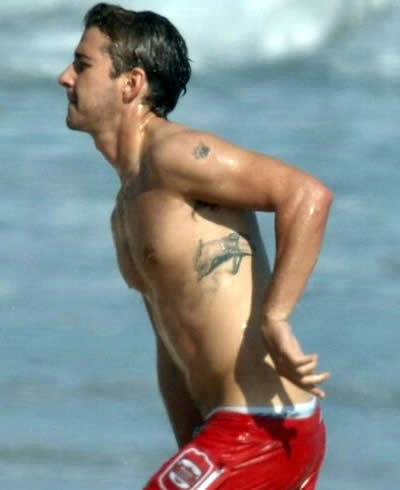 And finally, Shia LaBeouf has a small dog paw print on his left shoulder, 
