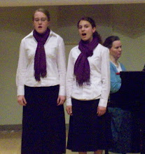 Missie and Britnee singing their duet at competition
